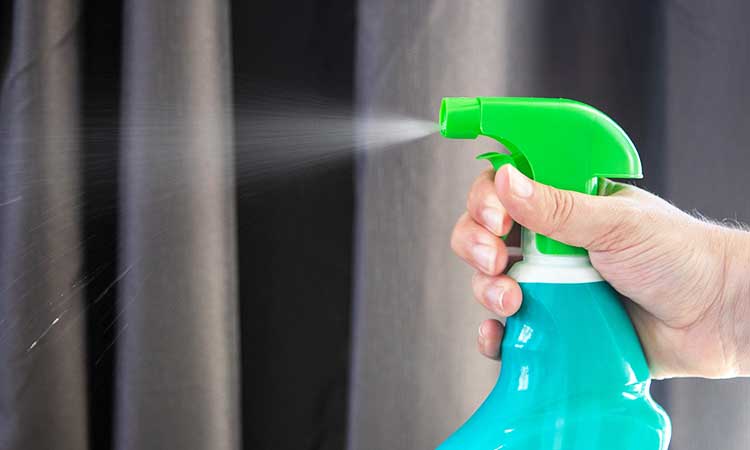 cleaning the dust, spray bottle