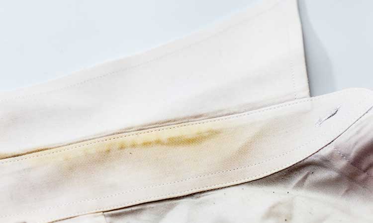 why yellow stains on white clothes, yellowed collar